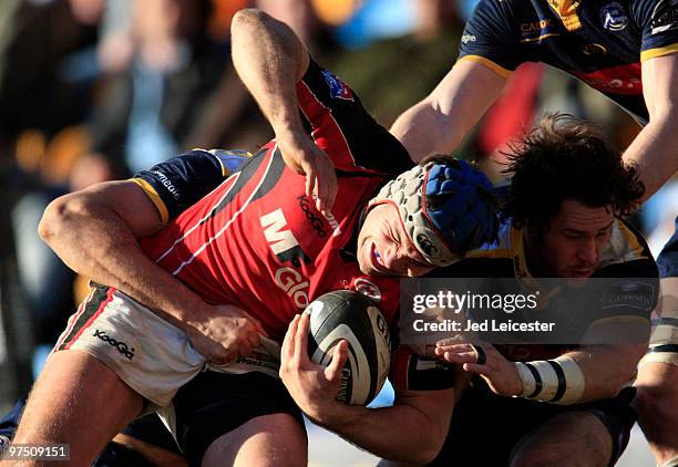 Schalk Brits of Saracens is tackled by Scott Mathie of Leeds Carnegie during the Guinness Premiership match between Leeds Carnegie and Saracens at...