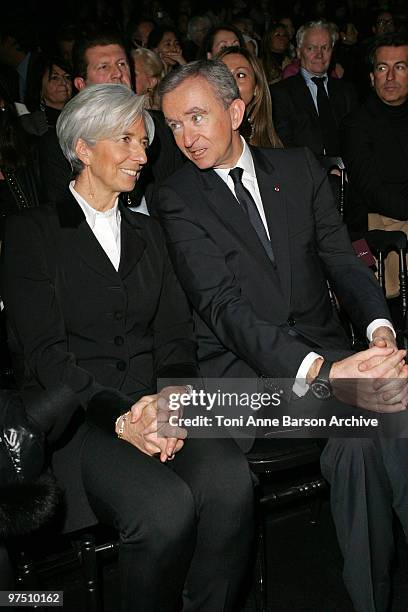 Christine Lagarde and Bernard Arnault attend the Christian Dior Ready to Wear show as part of the Paris Womenswear Fashion Week Fall/Winter 2011 at...