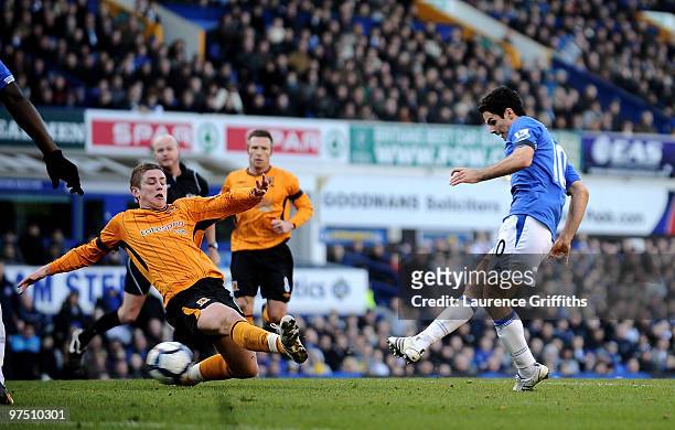 Mikel Arteta of Everton scores the second goal during the Barclays Premier League match between Everton and Hull City at Goodison Park on March 7,...