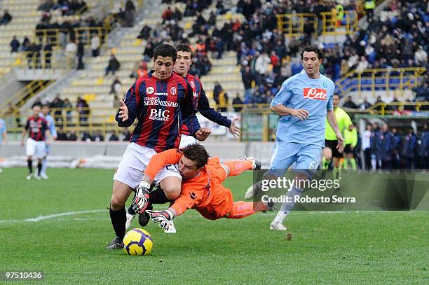 Henry Gimenez of Bologna competes with Morgan De Sanctis goal keeper of Napoli in action during the Serie A match between Bologna FC and SSC Napoli...