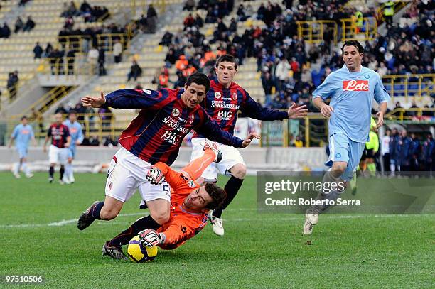 Henry Gimenez of Bologna competes with Morgan De Sanctis goal keeper of Napoli in action during the Serie A match between Bologna FC and SSC Napoli...