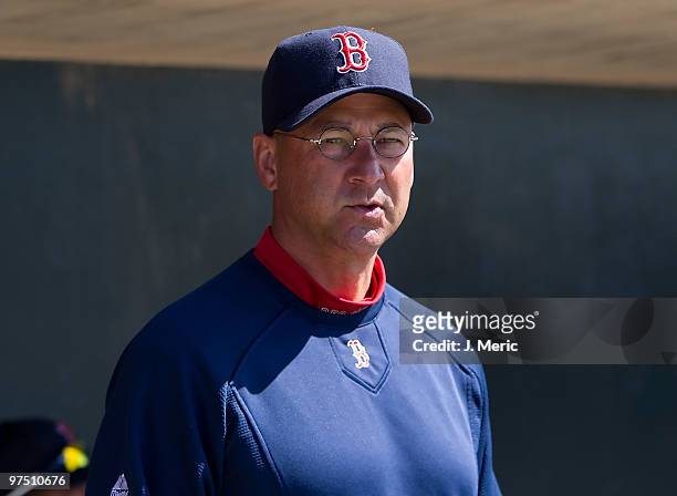 Manager Terry Francona of the Boston Red Sox looks out of the dugout against the Baltimore Orioles during a Grapefruit League Spring Training Game at...