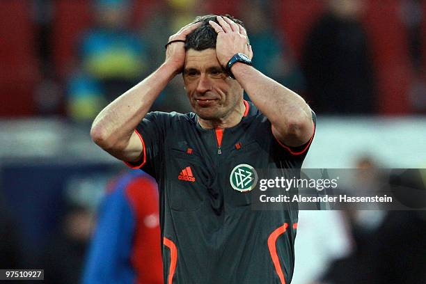 Referee Markus Merk reacts during the charity match for earthquake victims in Haiti between ran Allstar team and National team of Haiti at Impuls...