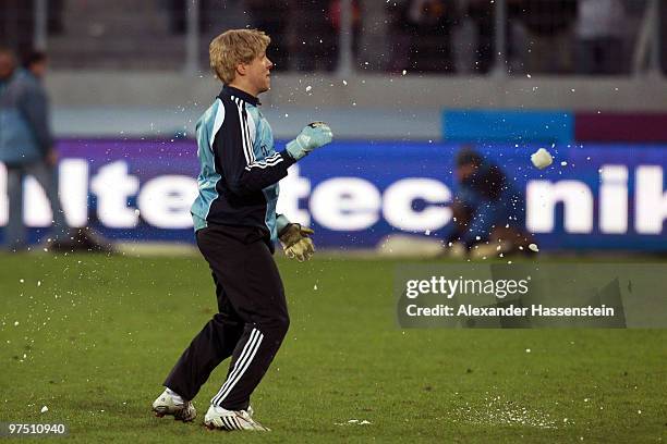 Oliver Pocher of the ran AllstarTeam challenge for snow balls during the charity match for earthquake victims in Haiti between ran Allstar team and...