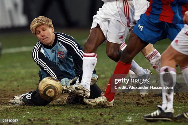 Oliver Pocher of the ran AllstarTeam challenge for the ball during the charity match for earthquake victims in Haiti between ran Allstar team and...