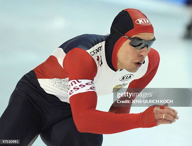 Russia's Dmitry Lobkov competes in the men's 500m Speed Skating race of the ISU World Cup in the eastern German city of Erfurt on March 7, 2010....