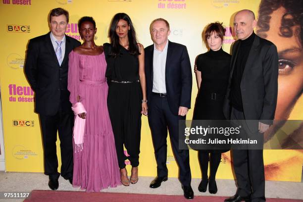 Roch Lener, Waris Dirie, Liya Kebede, Francois-Henri Pinault, Sherry Hormann and Peter Hermann attend the 'Fleur du Desert' Paris premiere at Theatre...