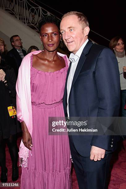 Waris Dirie and Francois-Henri Pinault attend the 'Fleur du Desert' Paris premiere at Theatre Marigny on March 7, 2010 in Paris, France.