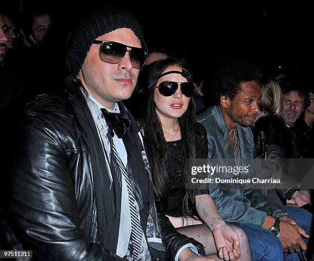 Lindsay Lohan and Gary Dourdan attend the Viktor & Rolf Ready to Wear show as part of the Paris Womenswear Fashion Week Fall/Winter 2011 at Espace...