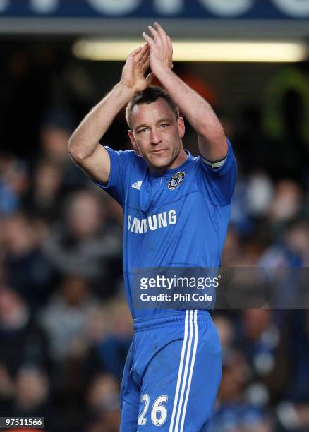 John Terry of Chelsea celebrates victory after scoring the second goal during the FA Cup sponsored by E.on Quarter Final match between Chelsea and...