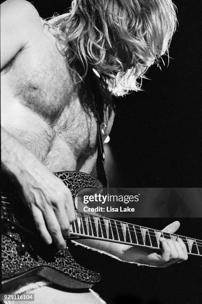 Phil Collen of Def Leppard performs on August 03, 1993 in Allentown, Pennsylvania.