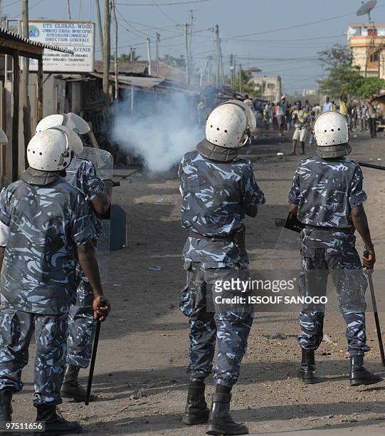 Togolese gendarmes and police forces fire tear gas on supporters of Jean-Pierre Fabre, leader of the Union of Forces of Change , the main party of...