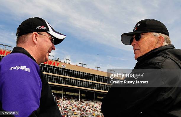 Mike Ford , crew chief for the FedEx Toyota, speaks with team owner Joe Gibbs prior to the start of the NASCAR Sprint Cup Series Kobalt Tools 500 at...