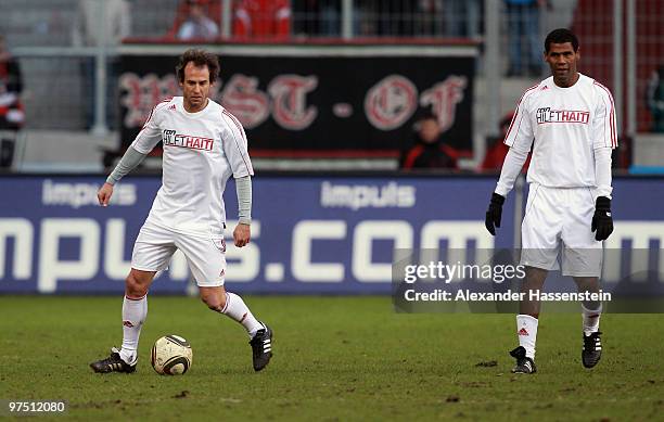 Mehmet Scholl of the ran AllstarTeam runs with the ball during the charity match for earthquake victims in Haiti between ran Allstart team and...