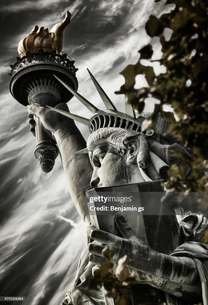 Statue of Liberty under cloudy sky, Liberty Island, Manhattan, New York City, New York State, USA