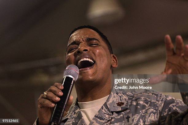 Gospel chaplain Maj. Shon Neyland gives a sermon at a gospel service March 7, 2010 at Kandahar Air Field in southern Afghanistan. Military chaplains...