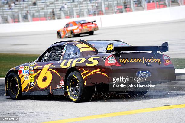 David Ragan drives the UPS Ford down pit road after an incident on the track during the NASCAR Sprint Cup Series Kobalt Tools 500 at Atlanta Motor...