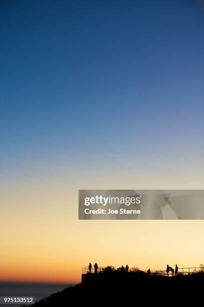 sunset watchers - sterne stock pictures, royalty-free photos & images