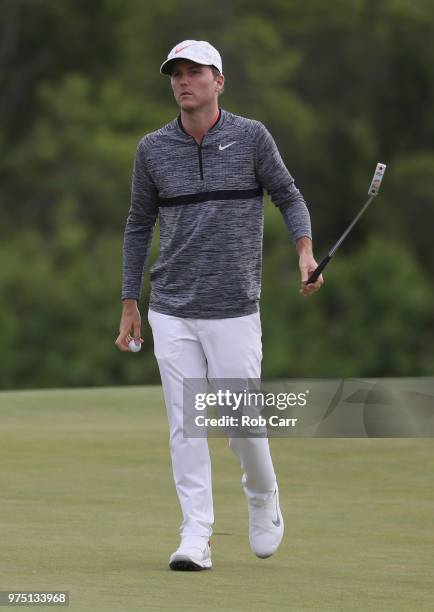 Russell Henley of the United States walks off the 11th green during the second round of the 2018 U.S. Open at Shinnecock Hills Golf Club on June 15,...