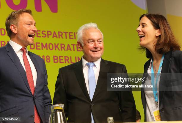 May 2018, Germany, Berlin: Christian Lindner , FDP chairman, Wolfgang Kubicki and Katja Suding talking at the start of the FDP's 69th Ordinary...
