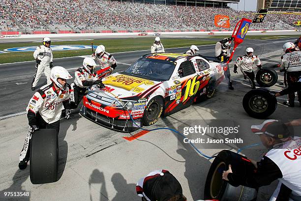 Greg Biffle, driver of the U.S. Census Ford, pits during the NASCAR Sprint Cup Series Kobalt Tools 500 at Atlanta Motor Speedway on March 7, 2010 in...