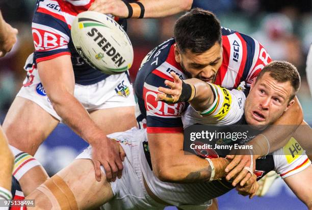 Trent Merrin of the Panthers passes the ball during the round 15 NRL match between the Sydney Roosters and the Penrith Panthers at Allianz Stadium on...