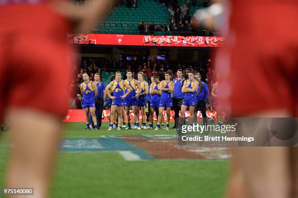 Eagles players show their dejection after defeat during the round 13 AFL match between the Sydney Swans and the West Coast Eagles at Sydney Cricket...