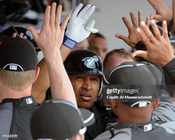 Outfielder Vernon Wells of the Toronto Blue Jays celebrates a home run against the Detroit Tigers March 7, 2010 at Dunedin Stadium in Dunedin,...