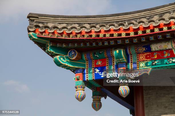 colorful rooftop of building on qianmen street, beijing, china - qianmen stock pictures, royalty-free photos & images