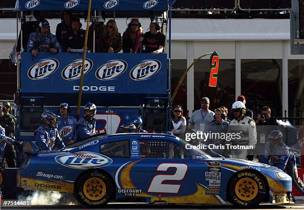 Kurt Busch, driver of the Miller Lite Dodge, pits during the NASCAR Sprint Cup Series Kobalt Tools 500 at Atlanta Motor Speedway on March 7, 2010 in...