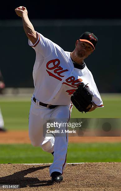 Pitcher Jeremy Guthrie of the Baltimore Orioles pitches against the Boston Red Sox during a Grapefruit League Spring Training Game at Ed Smith...
