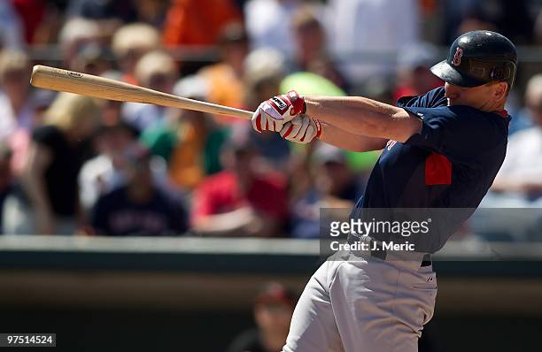 Outfielder J.D. Drew of the Boston Red Sox bats against the Baltimore Orioles during a Grapefruit League Spring Training Game at Ed Smith Stadium on...