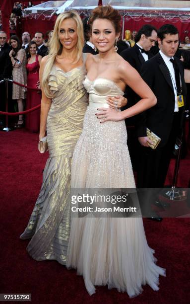 Singer Miley Cyrus and her mother Tish Cyrus arrive at the 82nd Annual Academy Awards held at Kodak Theatre on March 7, 2010 in Hollywood, California.
