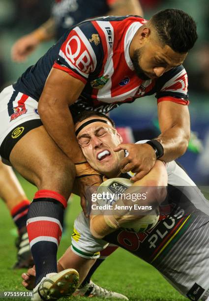 Isaah Yeo of the Panthers is tackled during the round 15 NRL match between the Sydney Roosters and the Penrith Panthers at Allianz Stadium on June...