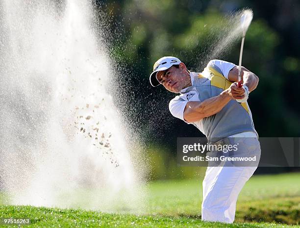 Camilo Villegas of Colombia plays a shot on the 13th hole during the final round of the Honda Classic at PGA National Resort And Spa on March 7, 2010...