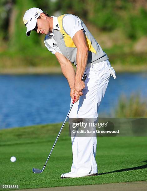 Camilo Villegas of Colombia plays a shot on the 14th hole during the final round of the Honda Classic at PGA National Resort And Spa on March 7, 2010...