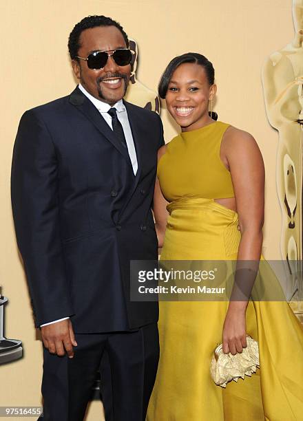 Director Lee Daniels and guest arrive at the 82nd Annual Academy Awards at the Kodak Theatre on March 7, 2010 in Hollywood, California.