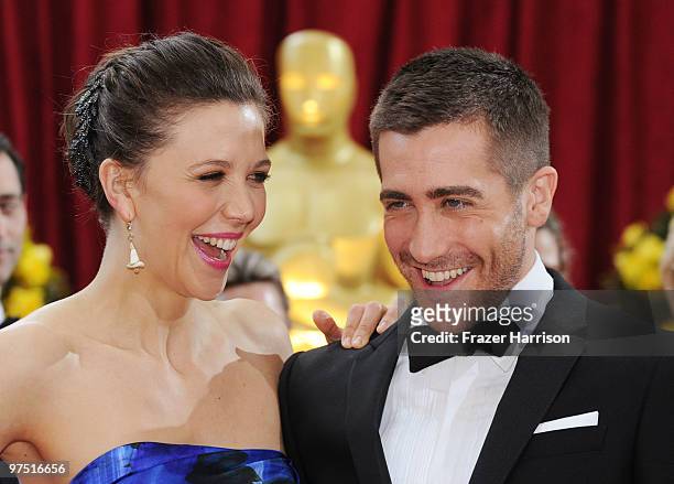 Actors Maggie Gyllenhaal and Jake Gyllenhaal arrive at the 82nd Annual Academy Awards held at Kodak Theatre on March 7, 2010 in Hollywood, California.