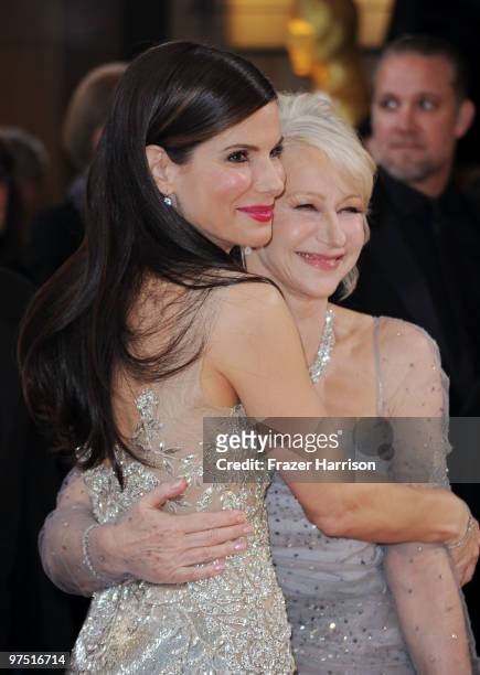 Actresses Sandra Bullock and Helen Mirren arrive at the 82nd Annual Academy Awards held at Kodak Theatre on March 7, 2010 in Hollywood, California.