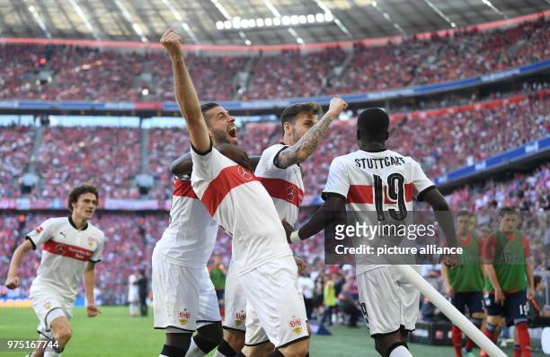 May 2018, Germany, Munich: Soccer: Bundesliga, Bayern Munich vs VfB Stuttgart, in the Allianz Arena. Stuttgart's Chadrac Akolo celebrating with...