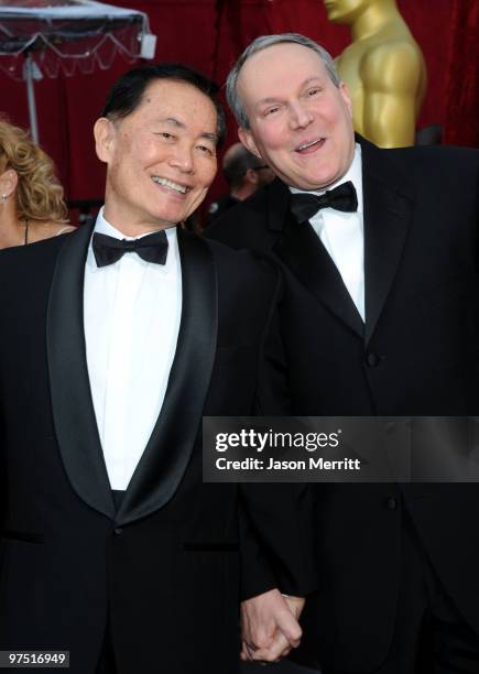Actor George Takei and husband Brad Altman arrive at the 82nd Annual Academy Awards held at Kodak Theatre on March 7, 2010 in Hollywood, California.