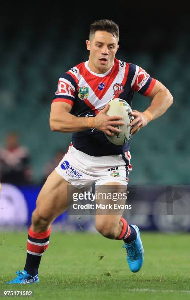 Cooper Cronk of the Roosters runs the ball during the round 15 NRL match between the Sydney Roosters and the Penrith Panthers at Allianz Stadium on...