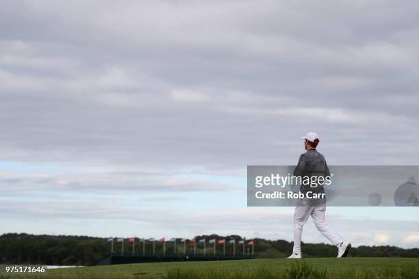 Russell Henley of the United States walks off the 13th tee during the second round of the 2018 U.S. Open at Shinnecock Hills Golf Club on June 15,...