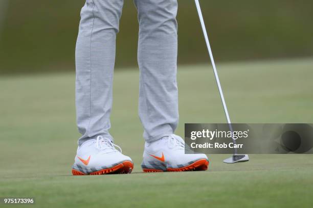 Detail shot of shoes worn by Tony Finau of the United States on the 13th green during the second round of the 2018 U.S. Open at Shinnecock Hills Golf...