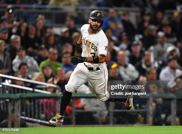 Sean Rodriguez of the Pittsburgh Pirates scores during the game against the Los Angeles Dodgers at PNC Park on June 6, 2018 in Pittsburgh,...