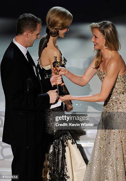 Director Pete Docter accepts Best Animated Feature award for "Up" from presenter Cameron Diaz onstage during the 82nd Annual Academy Awards held at...