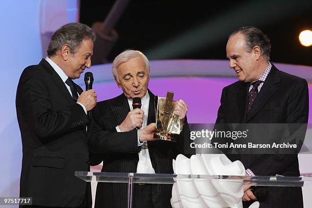 Charles Aznavour receives award from Michel Drucker, French Minister of Culture- Frederic Mitterand and Naguiperforms during the 25th Victoires de la...