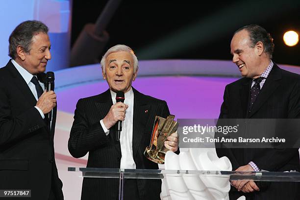 Charles Aznavour receives award from Michel Drucker, French Minister of Culture- Frederic Mitterand and Naguiperforms during the 25th Victoires de la...