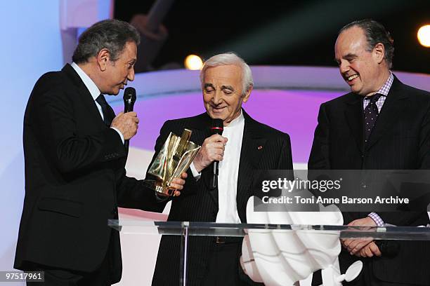 Charles Aznavour receives award from Michel Drucker, French Minister of Culture- Frederic Mitterand and Naguiperforms during the 25th Victoires de la...