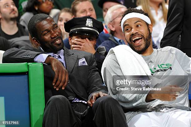 Rahseed Wallace speaks with his new teammate Michael Finley of the Boston Celtics during the game against the Washington Wizards on March 7, 2010 at...